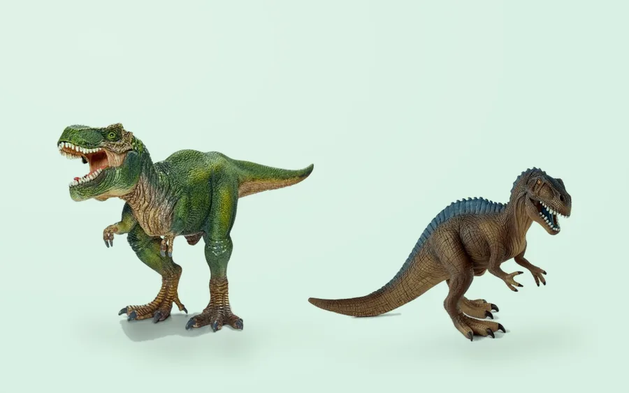 Schleich Tyrannosaurus rex en Acrocanthosaurus